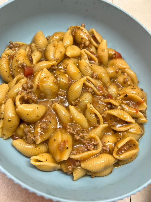 Instant Pot goulash with ground beef and pasta in a bowl