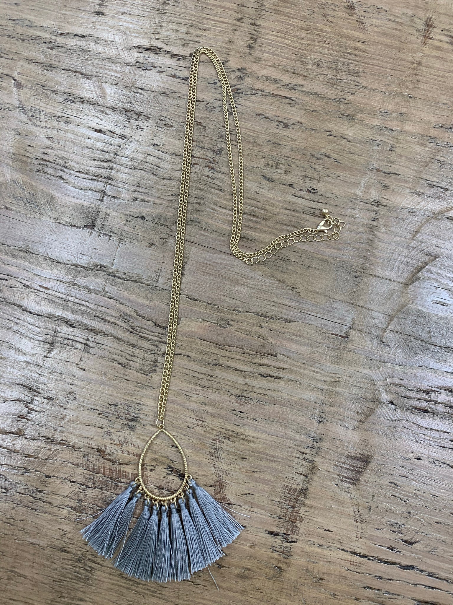 Tasseled teardrop pendant necklace