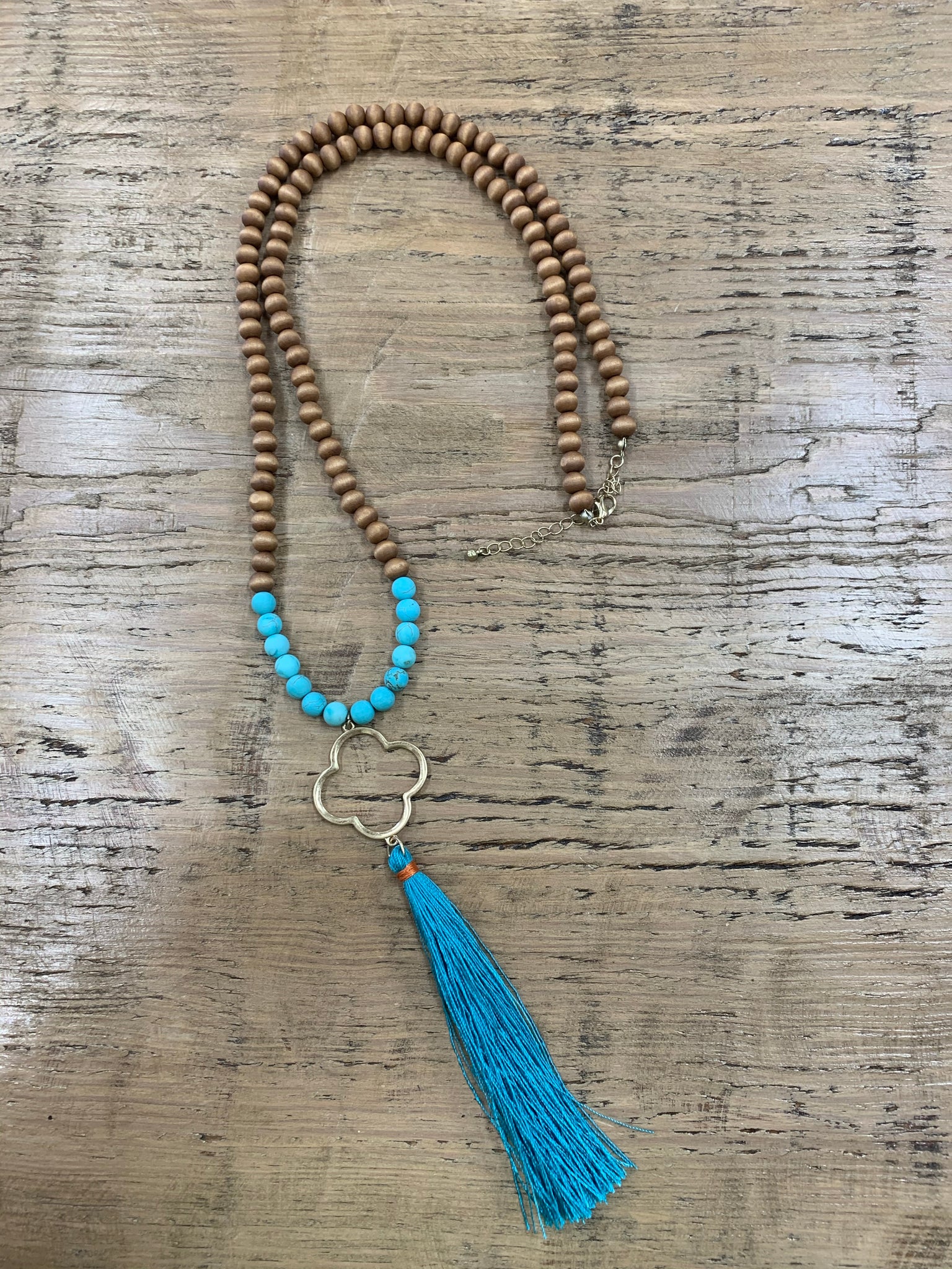 Clover tassel and bead necklace.